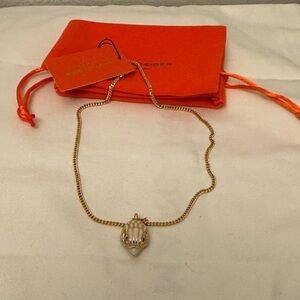 NWT Kurt GeiGer bird head necklace.